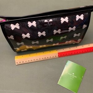 Kate Spade black and white tuxedo bow patent make up bag.
